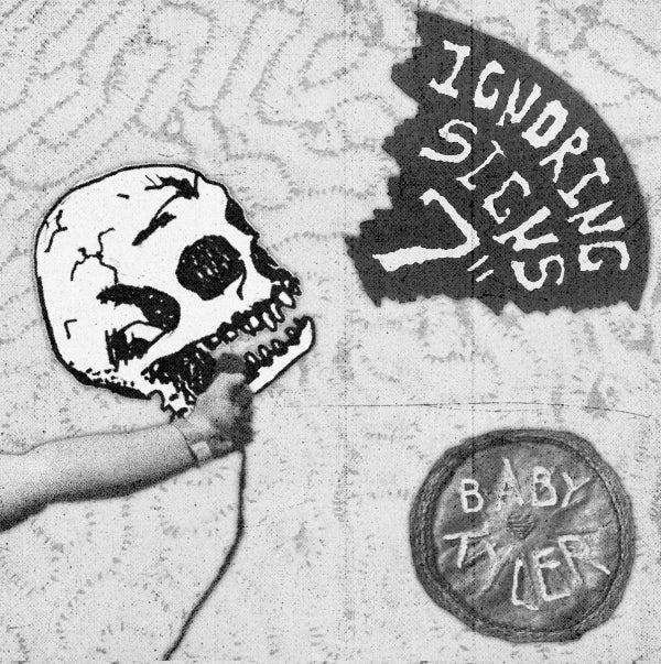 Black and white graphic print featuring a hand holding a skull, a torn banner reading 'I DON'T LIKE STICKS', and a circular badge reading 'BABY TIER'.
