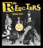Album cover for 'Dead City' by the band 'the Reactors'. The black-and-white photo features four band members and a black dog, with the band's name in large yellow font at the top and a yellow triangle logo in the center.