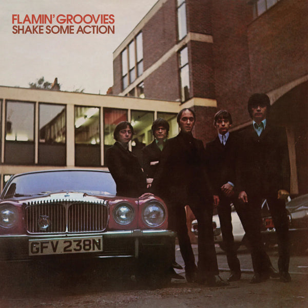 Album cover of 'Shake Some Action' by Flamin' Groovies with four men standing in front of a car.