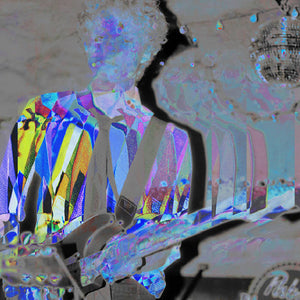a fractured and fragmented technicolor image of a person playing guitar.