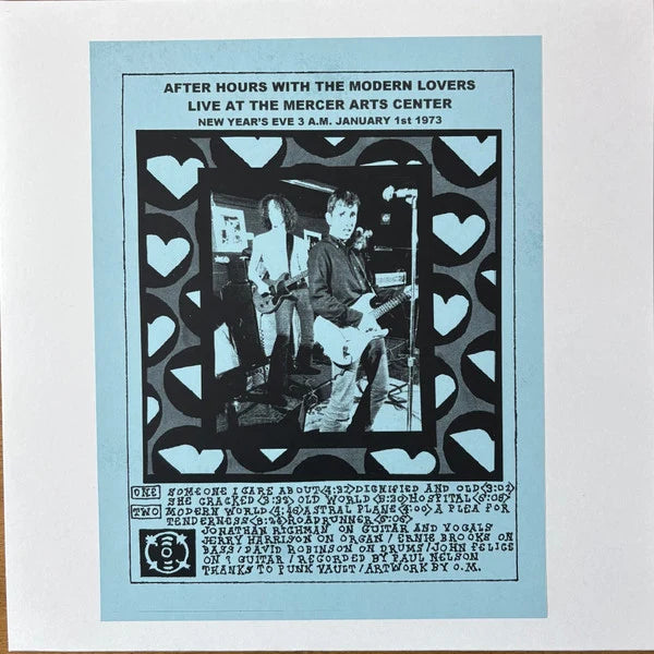 a blue picture of Modern Lovers live on stage framed with cut out hearts