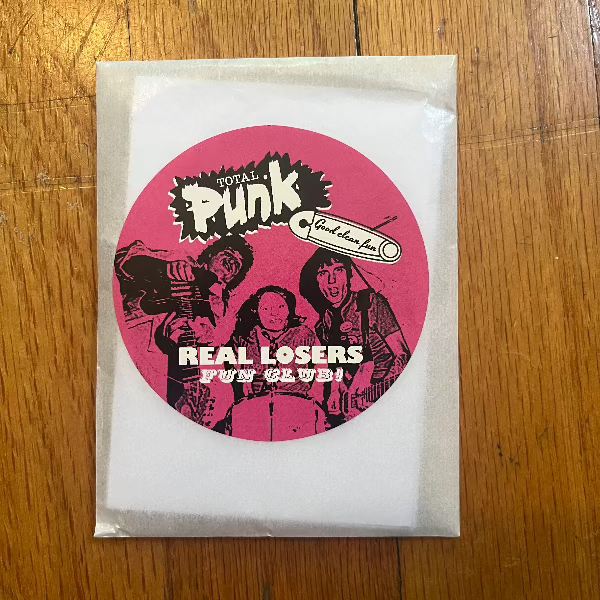 Closed pack of REAL LOSERS trading cards