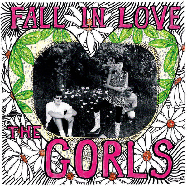 An image of the band under a tree framed in a heart surrounded by drawn flowers