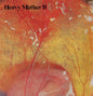 A close up image of an egg embryo with HEAVY MOTHER II written in a slightly wavy font in the upper left corner.