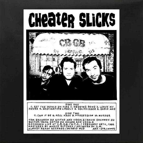 A pic of the CHEATER SLICKS standing in front of CBGBs